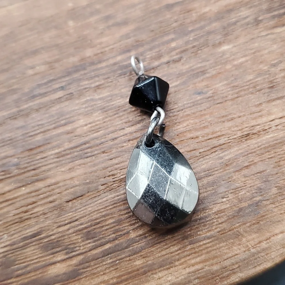 Metallic‎ midnight facet pendant